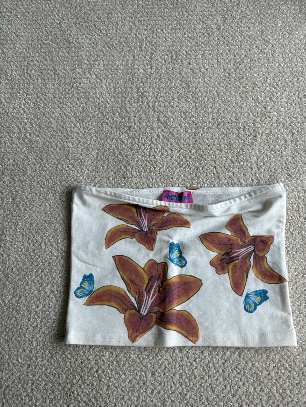 EDIKTED White Floral Tube Top with Orange Lilies and Blue Butterflies.